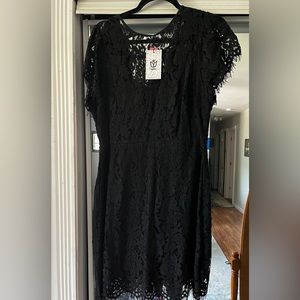 Andre by Unit black cocktail dress. Brand new with tags.
